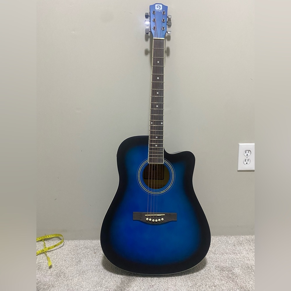 a new blue and black guitar wireless and wire